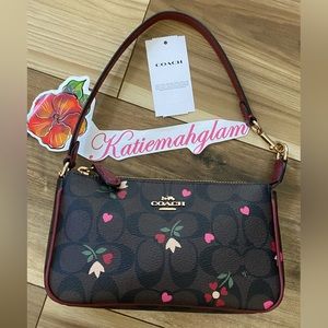 Coach Nolita heart petal print wristlet bag